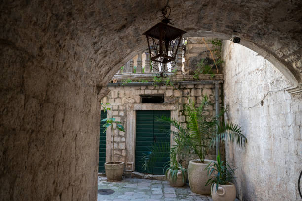 View through archway leading to old town streets