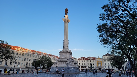 In June 2023, tourists were walking on Praça dom Pedro in Lisbon in Portugal