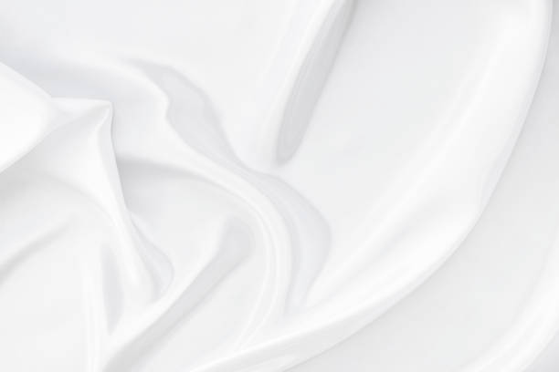 istock White gray satin texture that is white silver fabric silk background with beautiful soft blur pattern natural. 2109807111