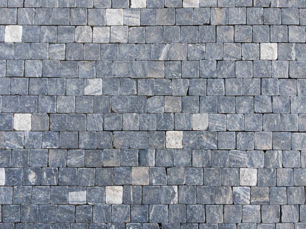 istock Close-up of a paving stone road. 2109833309