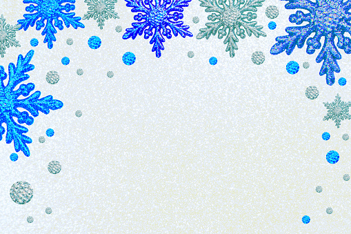 Christmas frame silver blue snowflakes White background Border sequin confetti Glitter powder sparkling Frosting winter Xmas holiday season Dots Snow Flake Decoration New Year glitter Toy Copy space