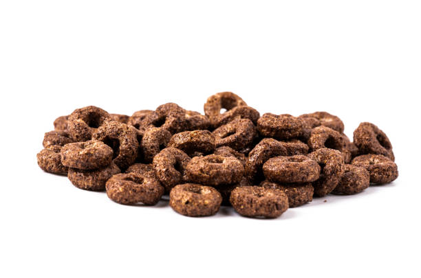Chocolate corn rings with milk isolated on white background. Dry breakfast. High quality photo
