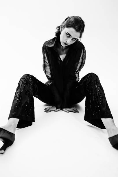 istock Fashion model in stylish clothes in studio. Modern style 2109854746