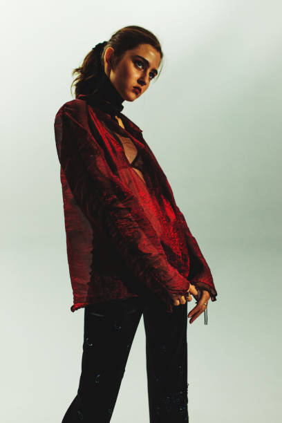 istock Fashion model in stylish clothes in studio. Modern style 2109887377