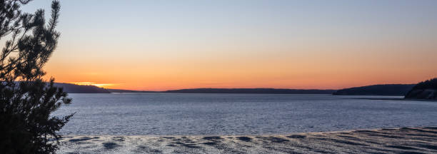 istock Sunset from Mabana Beach on Camano Island Washington 2109945314