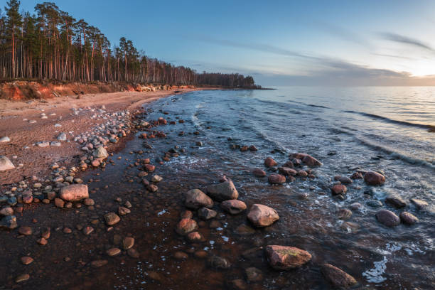 The rocky beach of Vidzeme in the spring sunset. Photographed with a drone