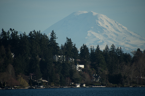 Looking at Ranier from Evergreen Floating Bridge, with Medina houses in front