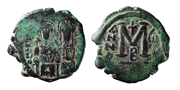 Byzantine Empire. Bronze Follis of Justin II and Sophia, 565-578 AD. Justin and Sophia seated facing on double throne. Beautiful desert patina.