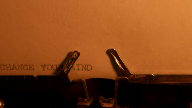 CHANGE YOUR MINDSET! typed words on a vintage typewriter.