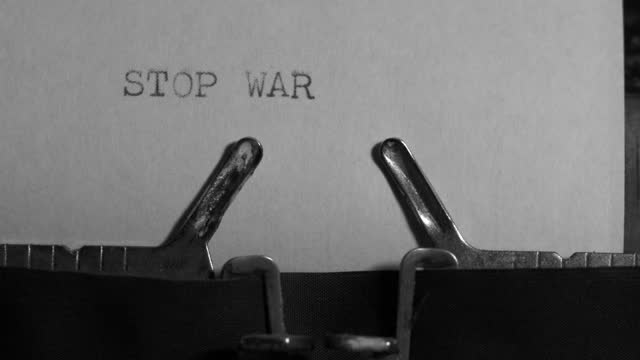 STOP WAR typed words on a vintage typewriter.