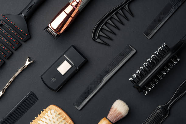 istock Variety of Hair Styling Tools and Accessories Displayed on a Dark Background 2110164604