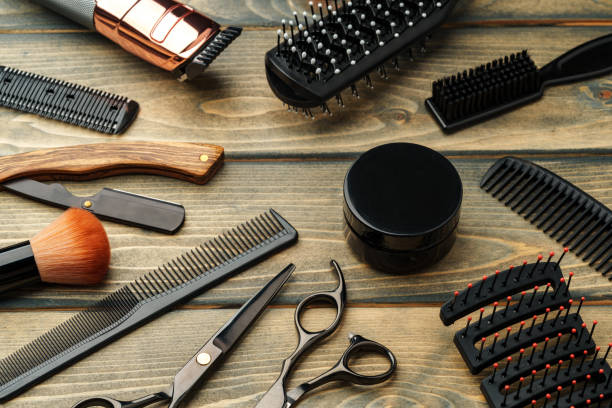 istock Set of professional barber tools on wooden table 2110164611