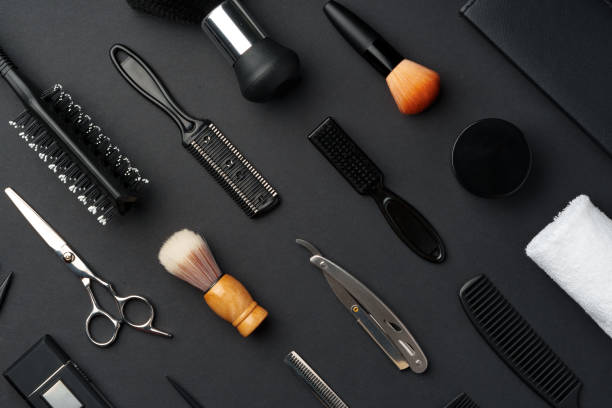 istock Variety of Hair Styling Tools and Accessories Displayed on a Dark Background 2110185544