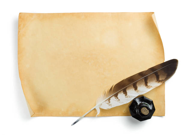 istock Feather, ink bottle, vintage paper sheet or parchment isolated on a white background 2110214292
