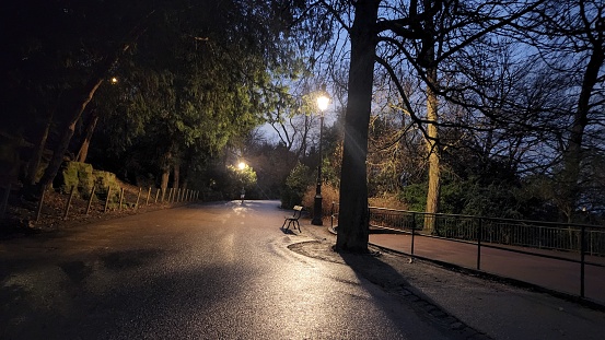 Paris, France, Europe, Path in the Buttes Chaumont park at night