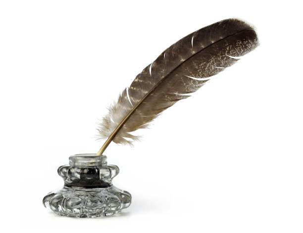 Feather quill and ink well.