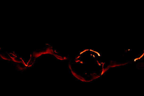 istock burning paper, glowing edge of paper 2110293104