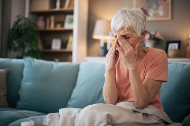 istock Senior woman having headache 2110307062