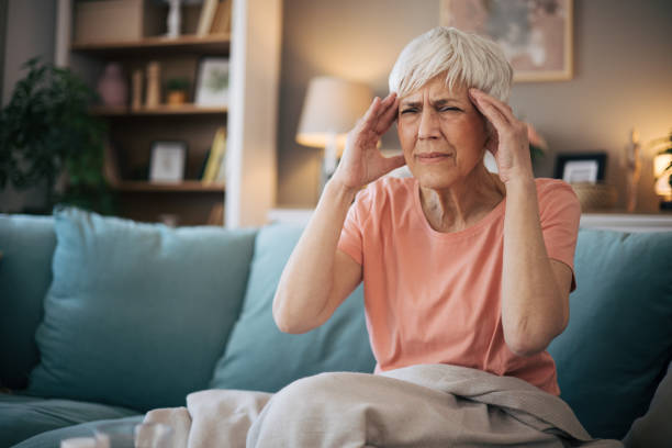 istock Senior woman having headache 2110308092