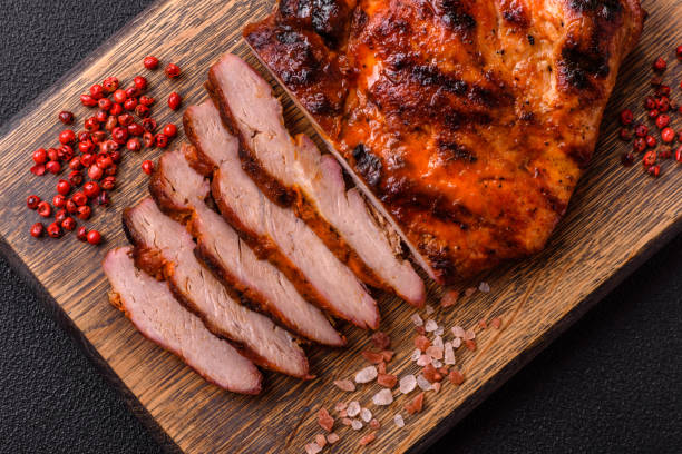istock Fresh juicy delicious beef steak on a dark background 2110314299