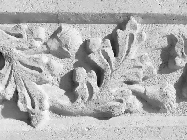 Cement decoration on old arch. Alicante city architecture, Spain