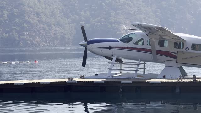 Float Planes Moored at the Vancouver Harbour Flight Centre - Sunny Day stock video