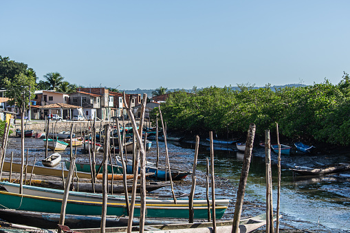 Santo Amaro, Bahia, Brazil - June 01, 2019: View of several canoes and boats in the port of Acupe, district of the city of Santo Amaro in Bahia.