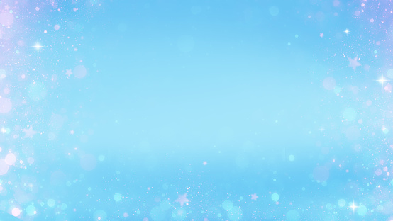 Abstract blue background with sparkles and pink confetti in the shape of stars.  copy space