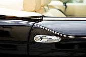 Luxury black car silver door handle