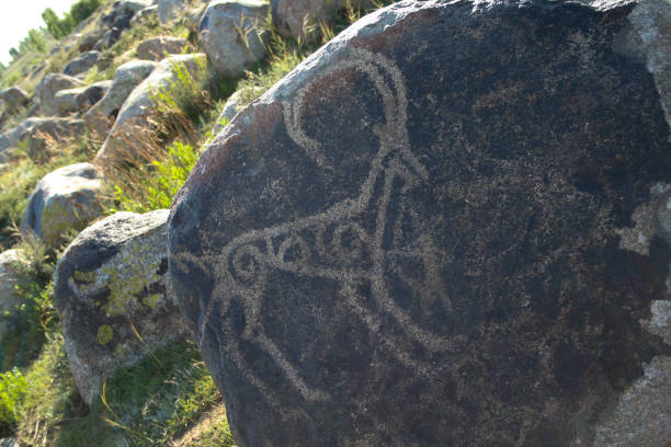 istock Ancient stone carvings at Cholpon Ata 2110442712
