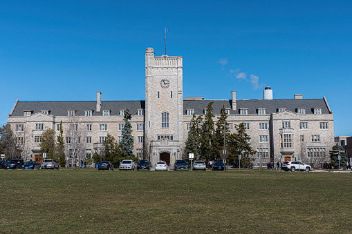 Guelph, ON, Canada - March 24, 2024 - Johnston Hall's stone tower is one of the University of Guelph's best-known landmarks. A traditional style co-ed residence, Johnston is home to 315 students who live primarily in double and triple rooms.