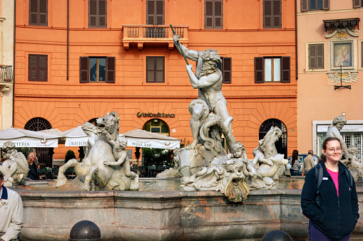 Statue in flower garden in Venice, Italy