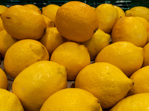 Fresh Lemons on Display at Grocery Store