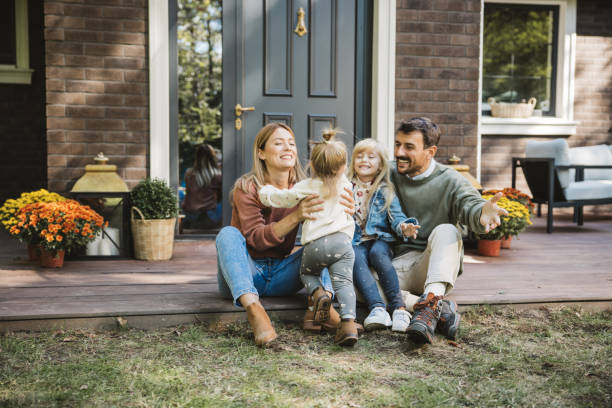 istock Young family enjoying in sunny day 2110509099
