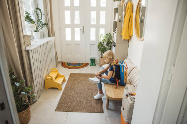 istock Schoolgirl preparing for school 2110527680