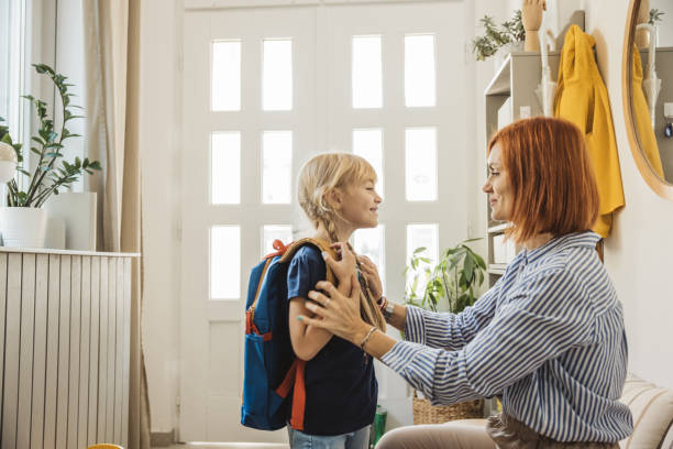 istock Schoolgirl preparing for school 2110528191