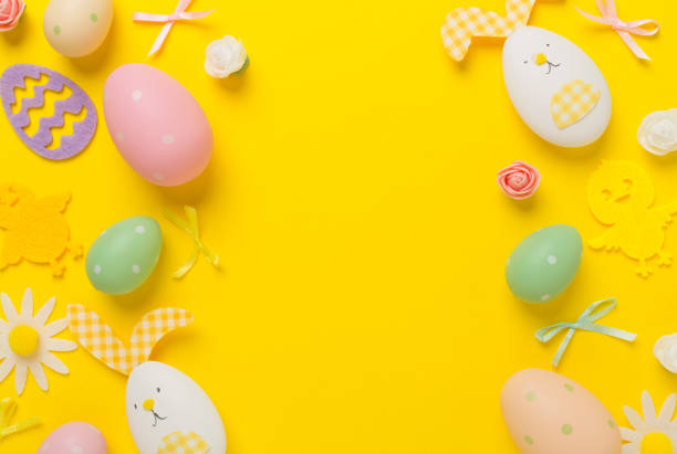 istock Easter eggs and decoration on color background, top view 2110529229