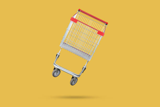 istock shopping cart isolated on yellow background 2110619516