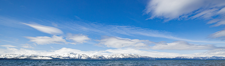 Wide angle landscape of the Sierra Nevada mountain range and Lake Tahoe, Nevada  USA