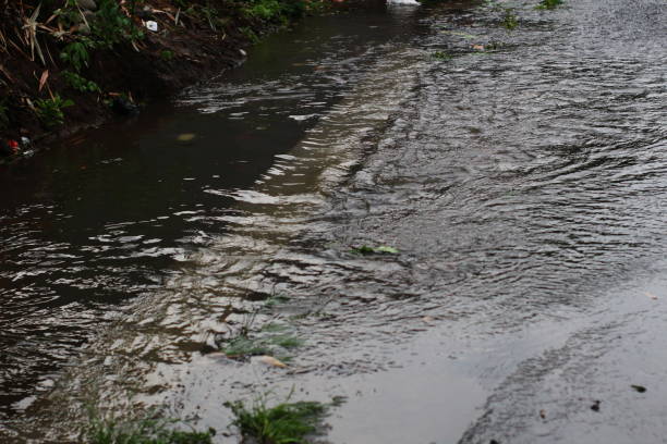 istock Puddles and flooding on public roads 2110763968