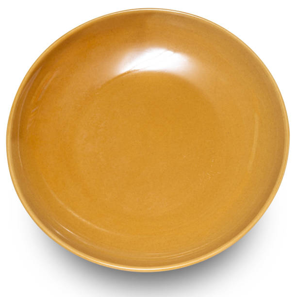 istock Brown circle ceramics plate isolated on white background. 2110825252