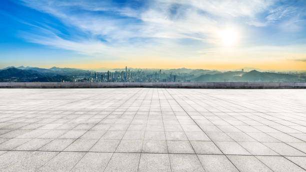 istock Empty square floor and modern city skyline with mountains. Road platform background 2110832073
