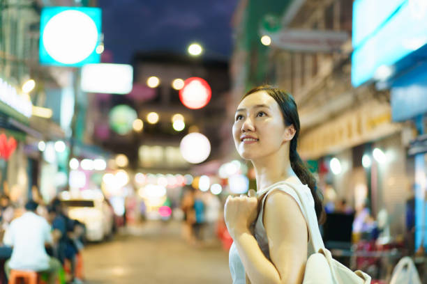 istock Women traveling in Chinatown. 2111013597