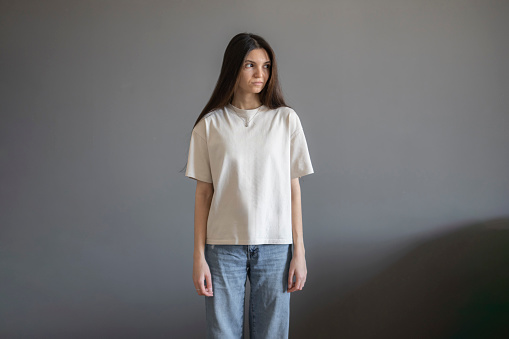 Young Woman Posing in a Plain White T-Shirt for a Casual Clothing Mockup