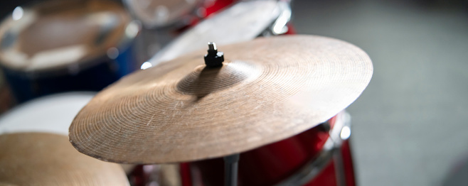 Close-Up View of a Drum Cymbal in a Music Studio Setting