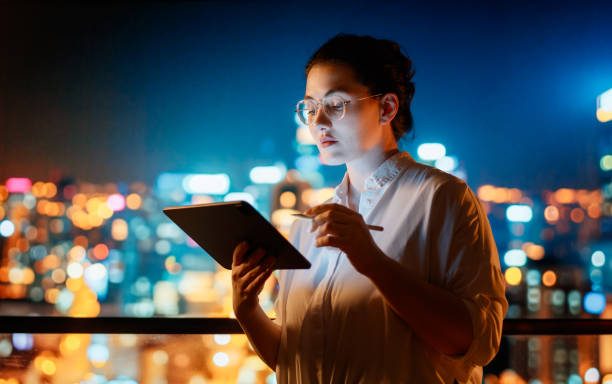 istock businesswoman working on tablet pc 2111026097
