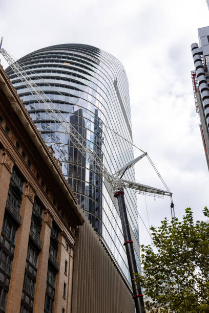 istock Construction of skyscrapers in city, background with copy space 2111083057