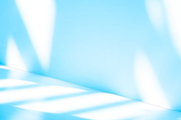 istock Wall interior background, studio, and backdrops show products. with shadow from window color white and blue light. background for text insertion and presentation of product 2111083189