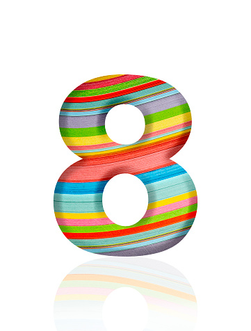 Close-up of three-dimensional multicolored paper stripes number 8 on white background.