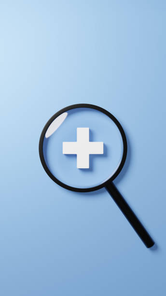 istock 3D Illustration.Magnifying glass and white cross on light blue background. Overhead view.(Vertical) 2111238849